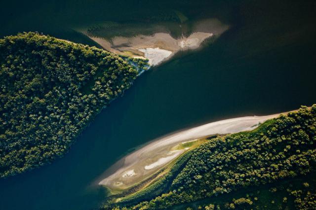 Aerial view showing the river and between it two wild islands 