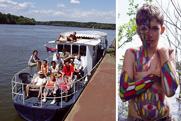 a group of people in a boat on a body of water