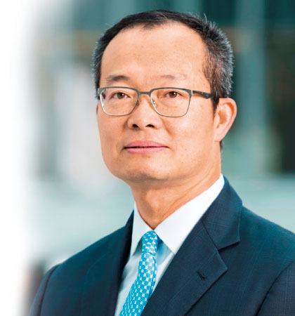 © worldbankgroup a man wearing a suit and tie
