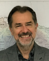 a man smiling for the camera