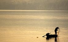 fisherman-romania-dawn.jpg?itok=04-EYiLc