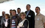 a group of people posing for the camera