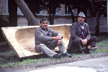 Credit: Szilárd a man sitting on a bench