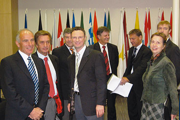 Credit: a group of people posing for the camera