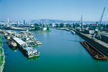 a boat is docked next to a body of water