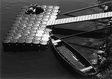 a boat sitting on top of a building