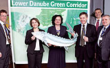 Credit: Stögmüller. a group of people posing for a photo