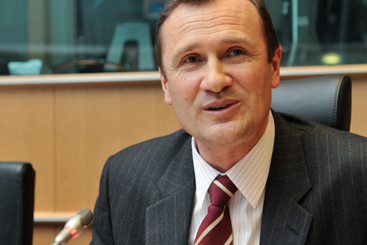 Credit: EPP a man wearing a suit and tie