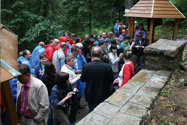 a group of people on a sidewalk