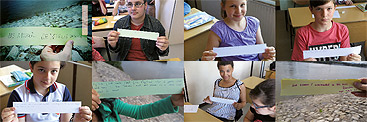 a group of people sitting at a desk