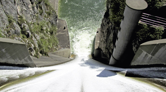 a man riding a skateboard up the side of a mountain