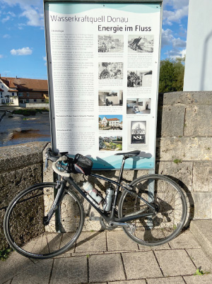 a bicycle parked on the side of a building