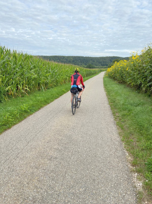© Fotos, Climate Ride 2020 a person riding a bike down a dirt road