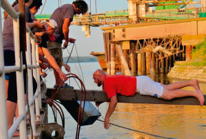 a group of people riding on the back of a boat