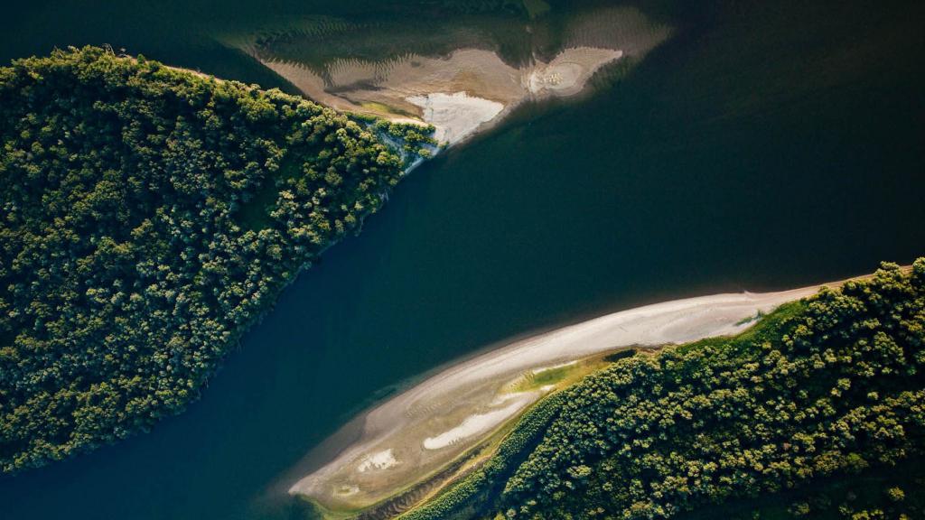 Aerial view showing the river and between it two wild islands 