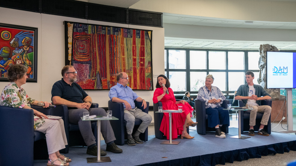 UNIS Vienna 6 persons sitting on a panel