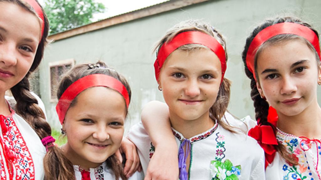 Four young girls in traditional dress