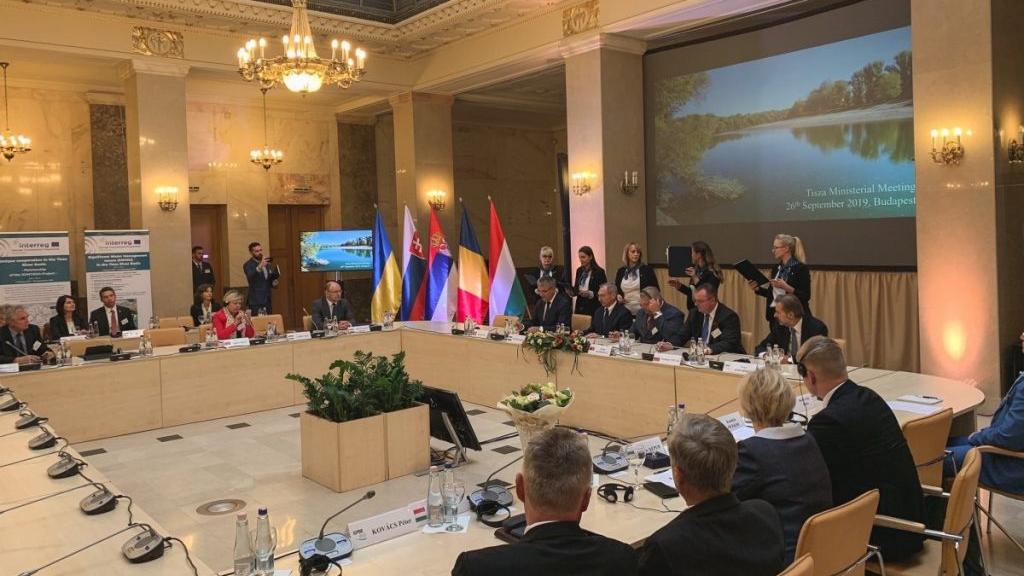 people sitting at a conference table