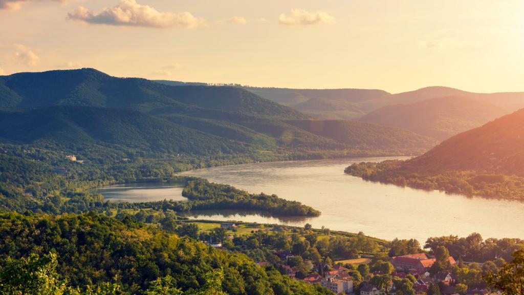 Aerial shot of the Danube river flowing through town