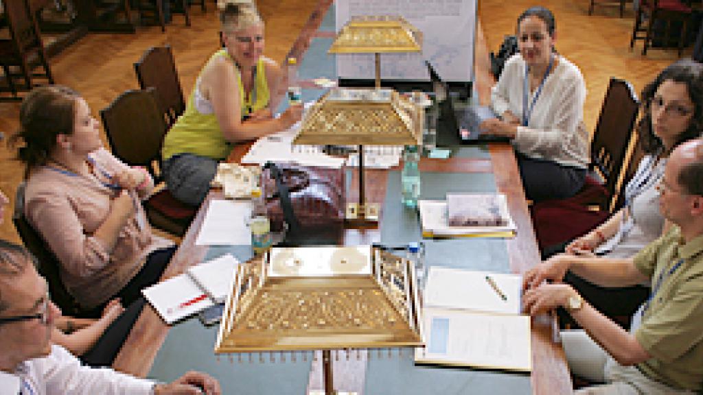 a group of people sitting at a table