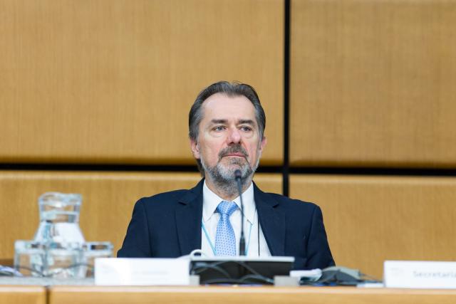 a man sitting at a table