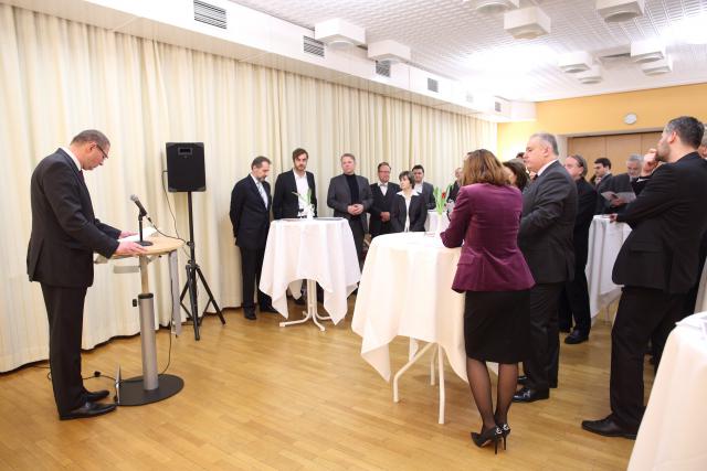 a group of people standing in a room