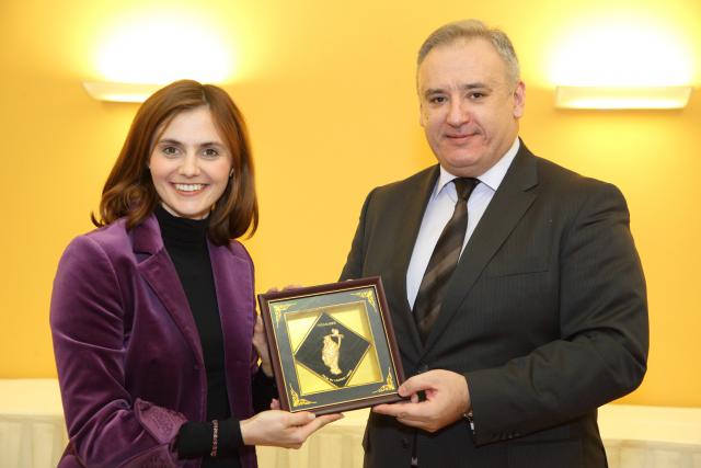 a man and a woman wearing a suit and tie