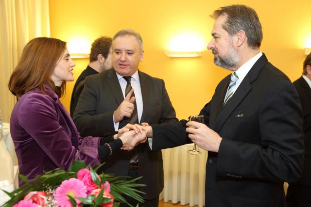 a man and a woman dressed in a suit and tie