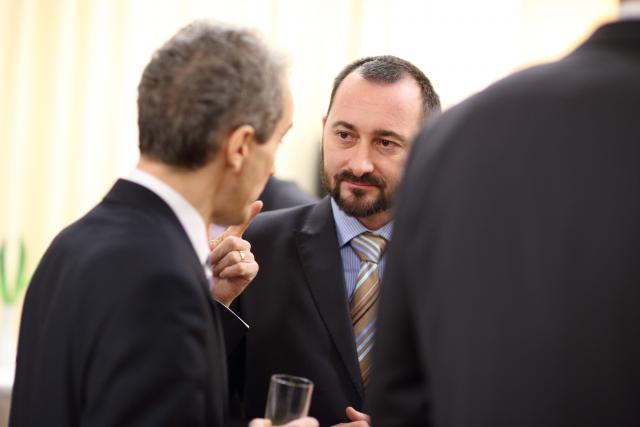 a man wearing a suit and tie