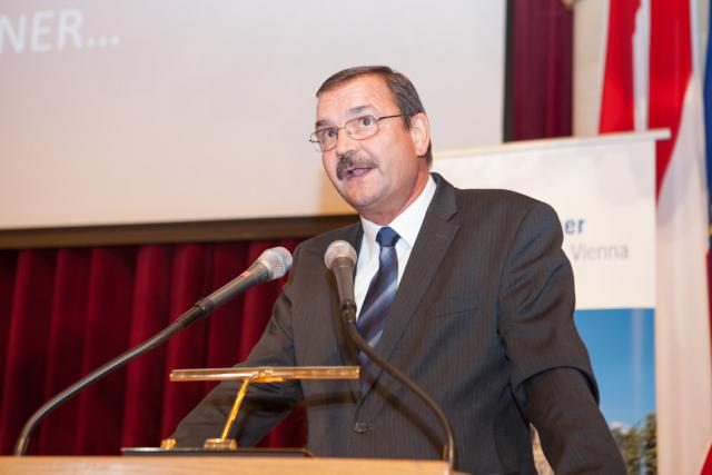 a man wearing a suit and tie