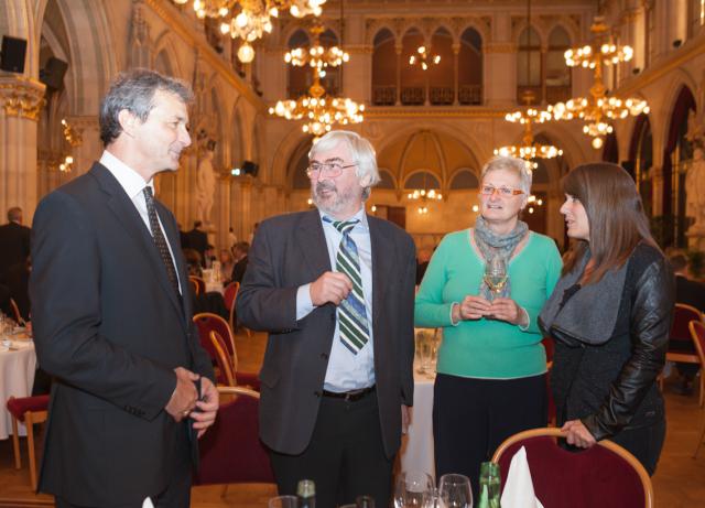 a group of people standing in a room