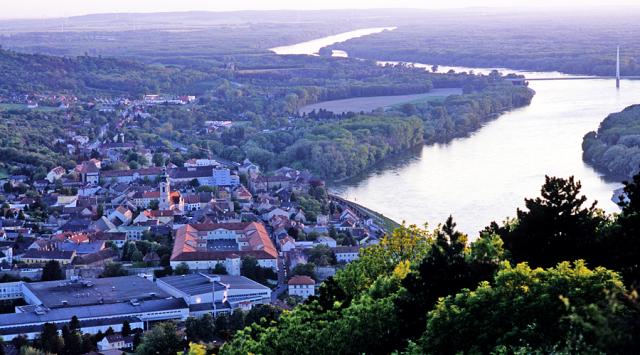 a view of a large body of water with a city in the background