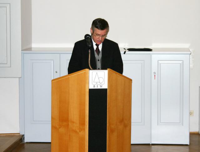 a person standing in front of a refrigerator