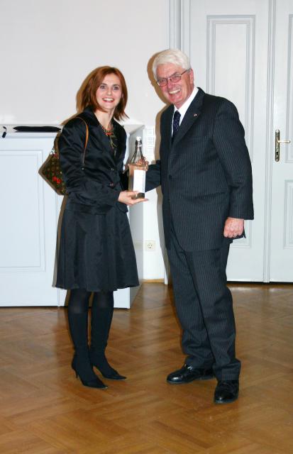 a man and a woman standing in a room