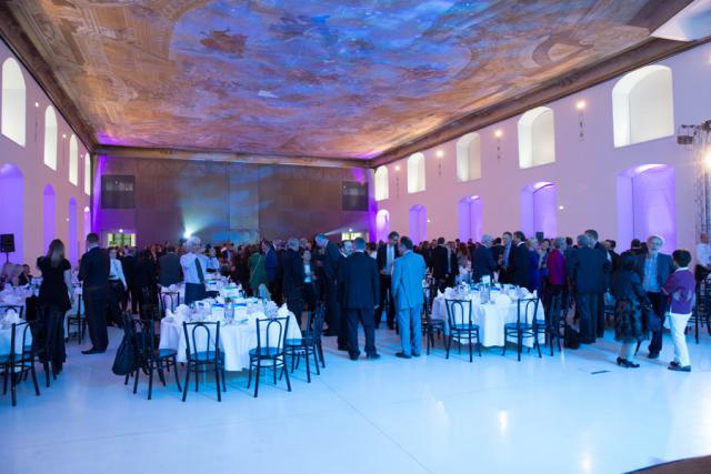 a group of people standing in a room