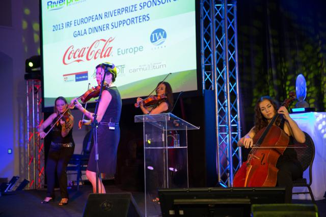 a group of people standing on a stage