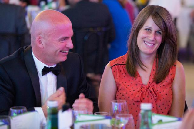 a man and a woman sitting at a table