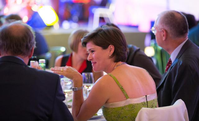 a man and a woman talking on a cell phone