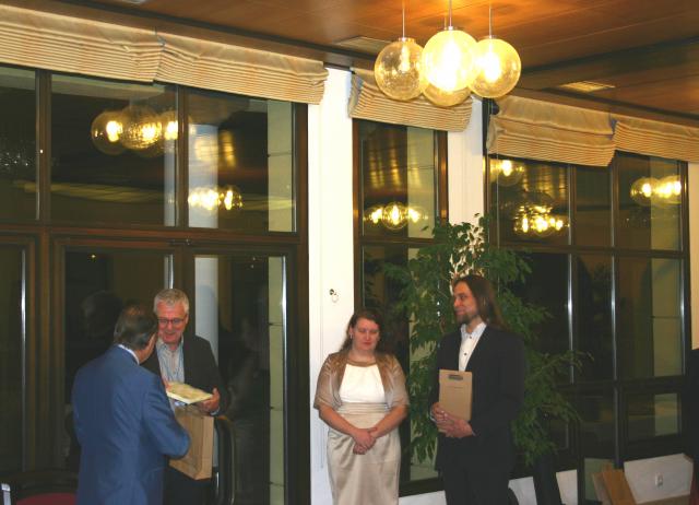 a group of people standing in front of a building