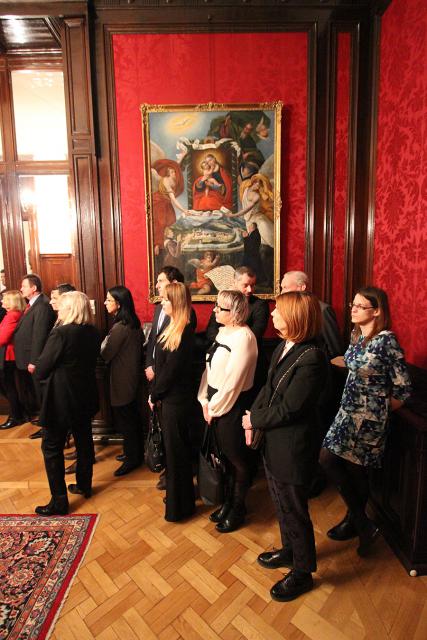 a group of people standing in a room