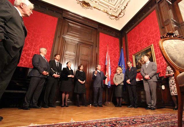 a group of people standing in a room