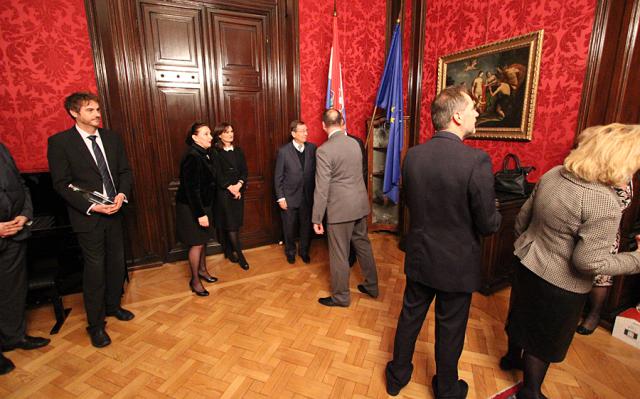 a group of people standing in a room