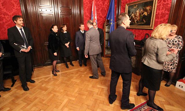 a group of people standing in a room