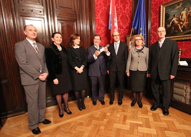 a group of people posing for a photo