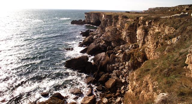 a rocky shore at the sea