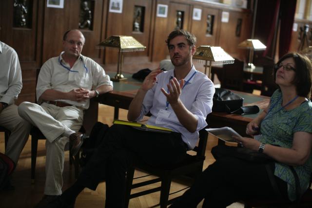 a group of people sitting at a table