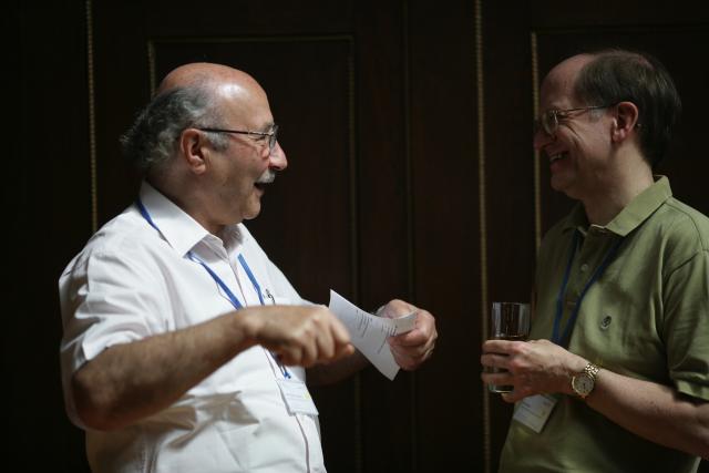 a man holding a glass of wine