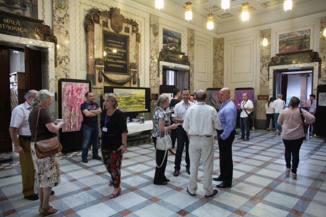 a group of people standing in a room