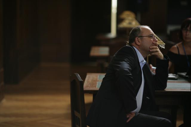 a man and a woman sitting at a table