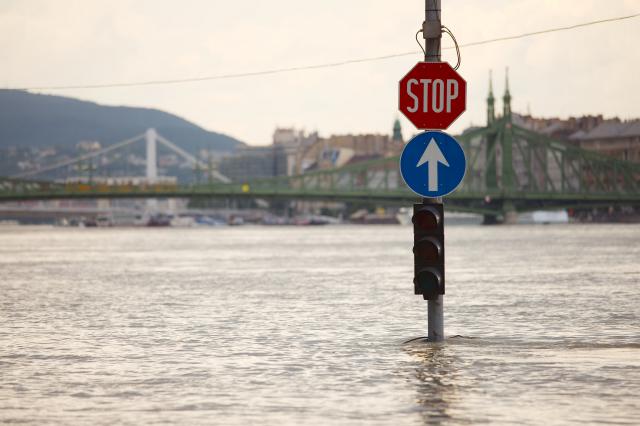 Stop sign in a flooded area